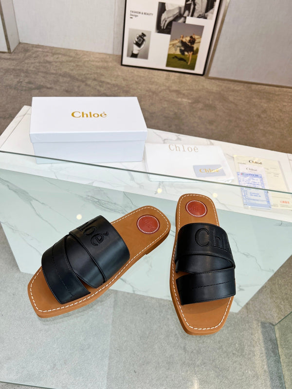 MULE CHLOÉ WOODY IN PELLE DI AGNELLO NERA CON LOGO RICAMATO