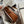 TEEN TRIOMPHE 18.5 TAN MONOGRAM CANVAS BROWN CALFSKIN