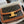 TEEN TRIOMPHE 18.5 TAN MONOGRAM CANVAS BROWN CALFSKIN