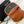 TEEN CHAIN BESACE TRIOMPHE 15.5CM BROWN MONOGRAM AND CALFSKIN TAN