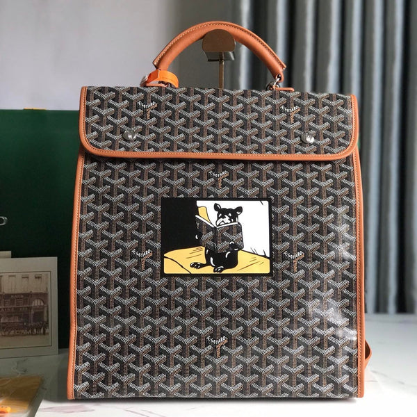 ZAINO SAINT LÉGER 35 IN TELA GOYARDINE MARRONE E PELLE DI VITELLO CON PATCH CARTONI ANIMATI