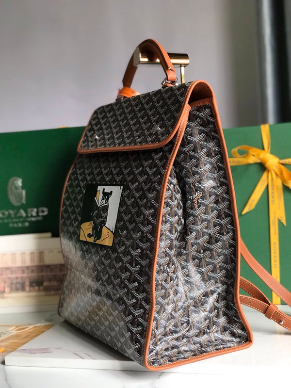 ZAINO SAINT LÉGER 35 IN TELA GOYARDINE MARRONE E PELLE DI VITELLO CON PATCH CARTONI ANIMATI