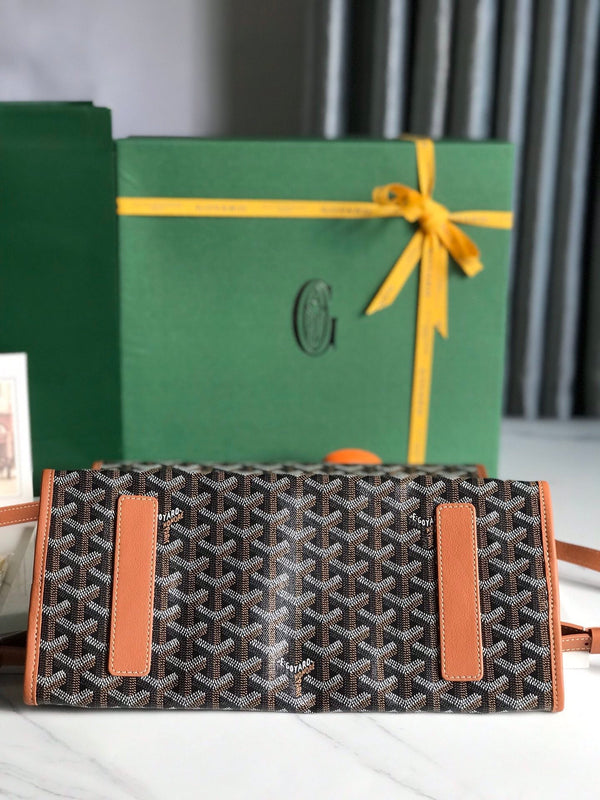 ZAINO SAINT LÉGER 35 IN TELA GOYARDINE MARRONE E PELLE DI VITELLO CON PATCH CARTONI ANIMATI