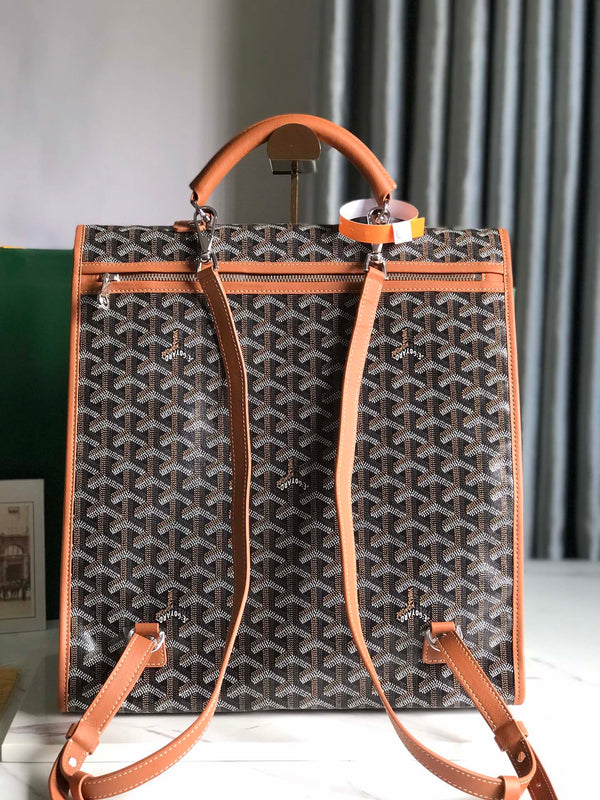 ZAINO SAINT LÉGER 35 IN TELA GOYARDINE MARRONE E PELLE DI VITELLO CON PATCH CARTONI ANIMATI