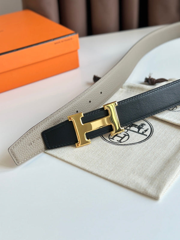 Cintura reversibile con fibbia H in oro HM da 32 mm, in pelle nera e beige 124654