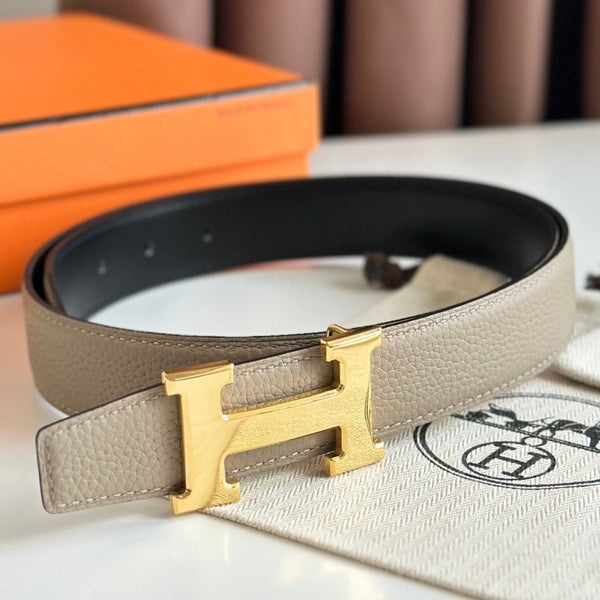 Cintura reversibile con fibbia H in oro HM da 32 mm, in pelle nera e beige 124654