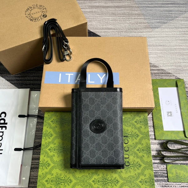 POCHETTE CON CHIUSURA GG 20 IN TELA NERA E PELLE DI VITELLO