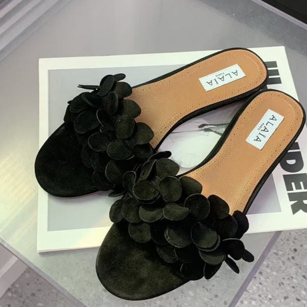 Ciabatte Alaia 25 Flower in pelle di pecora nera 293157