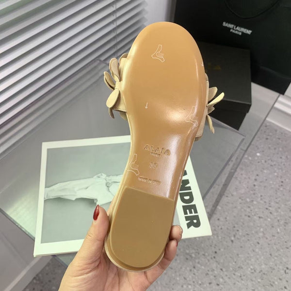 Alaia 25 Pantofole a Fiori in Pelle di Pecora Giallo Pallido 293158