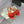 Ciabatte Alaia 25 Flower in pelle di pecora arancione 293159