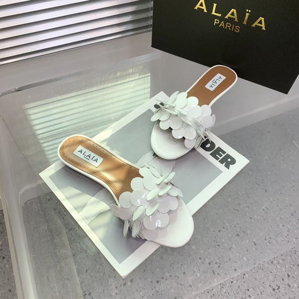 Ciabatte Alaia 25 Flower in pelle di pecora bianca 293161