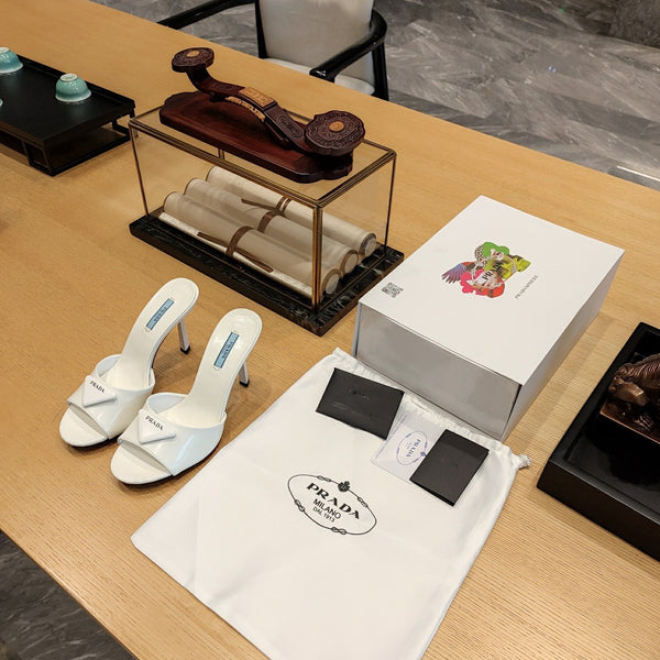 Prad 26s Open Toe Mules 100mm In Ivory White Patent Calfskin With Logo