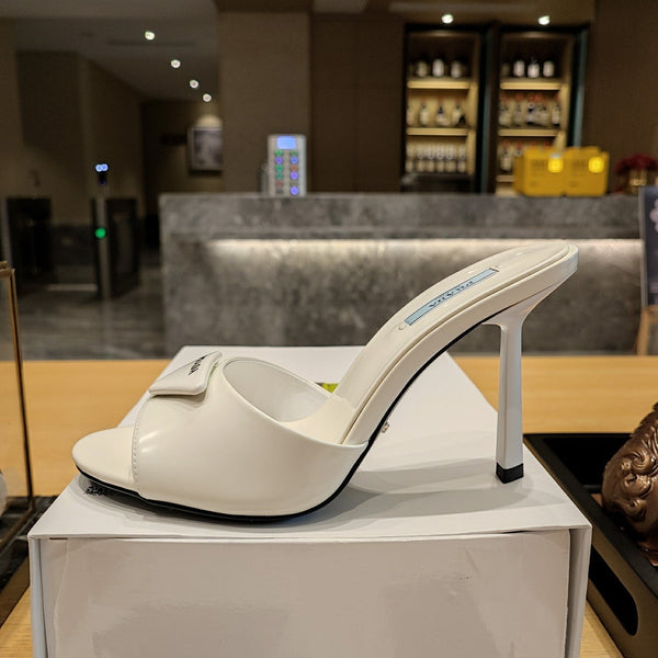 Prad 26s Open Toe Mules 100mm In Ivory White Patent Calfskin With Logo