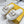 FENDI BAGUETTE SLIPPERS IN WHITE LAMBSKIN WITH GOLD HARDWARE