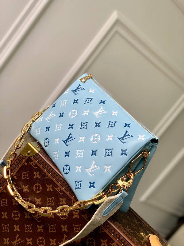 coussin pm 26 cm pelle di vitello stampata con monogramma bianco blu nuvola 