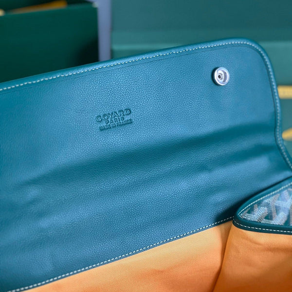 ZAINO SAINT LÉGER 35 IN TELA GOYARDINE VERDE E PELLE DI VITELLO CON PATCH CARTONI ANIMATI
