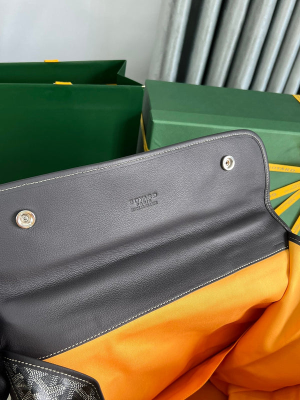 ZAINO SAINT LÉGER 35 IN TELA GOYARDINE NERA E PELLE DI VITELLO CON PATCH CARTONI ANIMATI