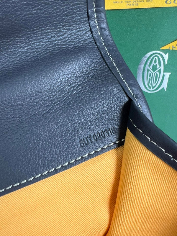 ZAINO SAINT LÉGER 35 IN TELA GOYARDINE NERA E PELLE DI VITELLO CON PATCH CARTONI ANIMATI
