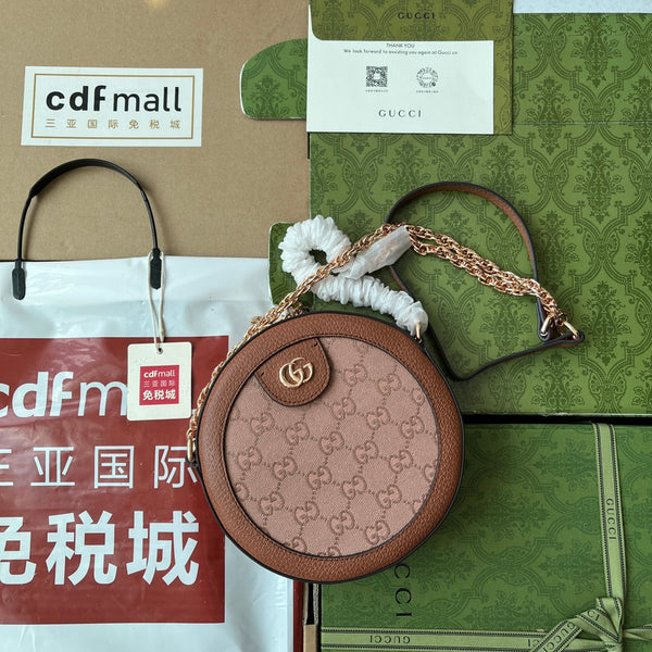 BORSA A TRACOLLA ROTONDA MINI OPHIDIA 18 IN TELA ROSA CIPRIA E RIFINITURE IN PELLE MARRONE