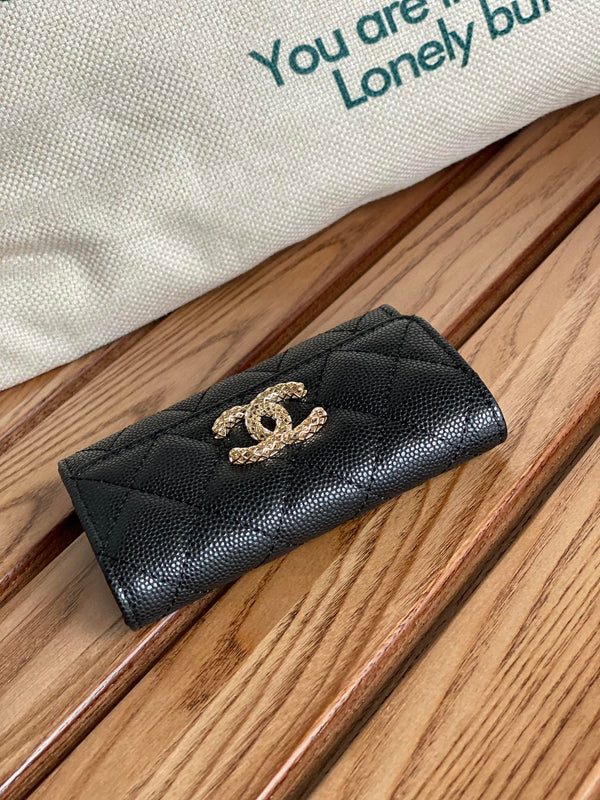 Portafoglio piccolo cc 11 cm caviale nero hardware oro chiaro