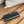 Portafoglio piccolo cc 11 cm in pelle di agnello nera con finiture dorate