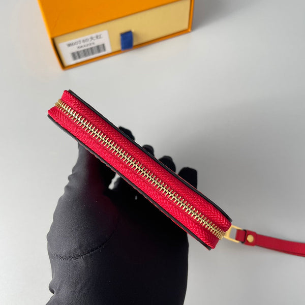 LV M60740 Portamonete Zippy in pelle monogrammata rossa 221610