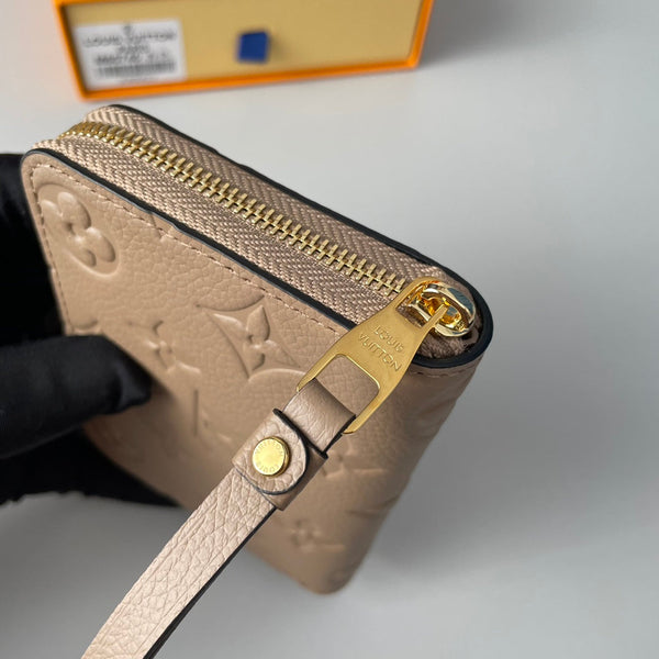 LV M60740 Portamonete Zippy Tourterelle Monogram Empreinte Pelle 221614