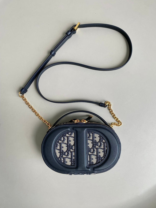 BORSA OVALE SIGNATURE 18 IN JACQUARD OBLIQUO BLU