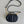 SIGNATURE 18 OVAL BAG IN BLACK CALFSKIN