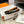HM FOCUS BUCKLE & REVERSIBLE BLACK AND ORANGE LEATHER STRAP 13MM GOLD HARDWARE