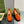 BLONDIE LOGO-PLAQUE LOAFERS IN TIGER ORANGE SUEDE