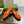 BLONDIE LOGO-PLAQUE LOAFERS IN TIGER ORANGE SUEDE