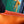 MONTE-CARLO PM CLUTCH 25 IN ORANGE GOYARDINE CANVAS