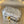 GOLDEN KNOT 19 IN SILVER LAMBSKIN