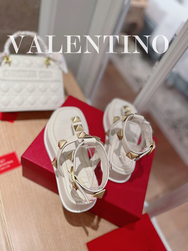 SANDALI INFRADITO ROCKSTUD IN PELLE DI VITELLO BIANCA