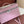 EXTRA POCKET L19 IN FLAMINGO PINK GRAINED CALFSKIN WITH SILVER HARDWARE