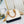 ALMA  BB 25 IN WHITE MONOGRAM DUNE CANVAS GOLD HARDWARE