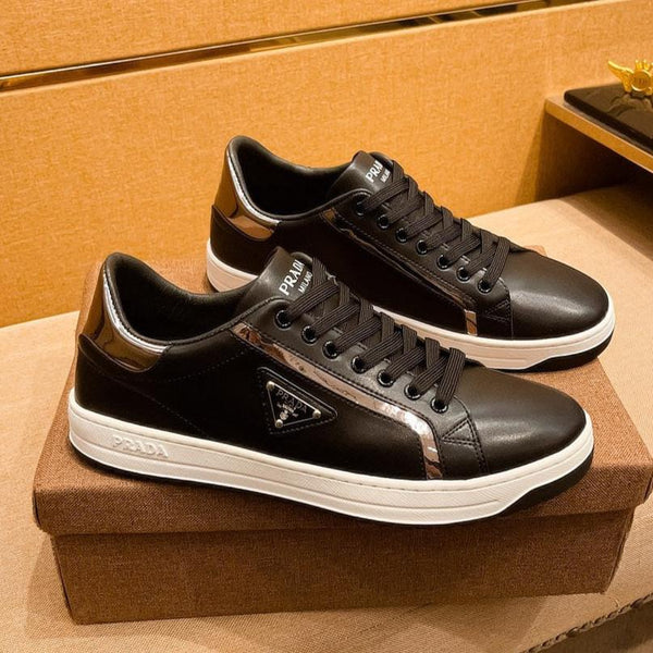 PRA SNEAKER IN BLACK CALFSKIN WITH GLOSSY GOLDEN