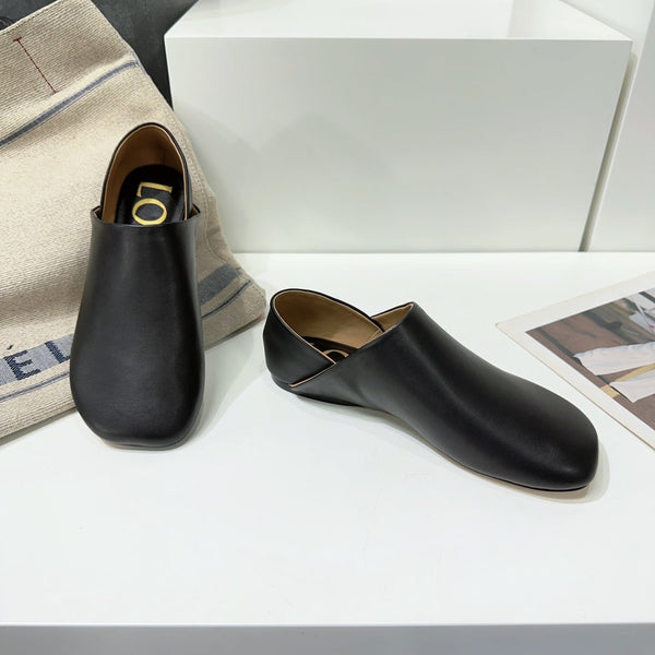 Pantofola giocattolo in pelle di capra nera