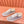 SNEAKER LV TRAINER IN PELLE DI VITELLO MONOGRAMMA BEIGE CAMMELLO