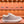 SNEAKER LV TRAINER IN PELLE DI VITELLO MONOGRAMMA BEIGE CAMMELLO