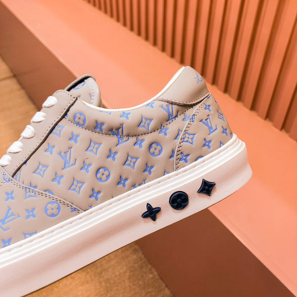 SNEAKER LV TRAINER IN PELLE DI VITELLO MONOGRAMMA BEIGE CAMMELLO