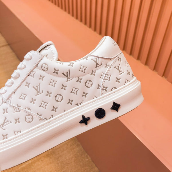 SNEAKER LV TRAINER IN PELLE DI VITELLO CON MONOGRAMMA BEIGE