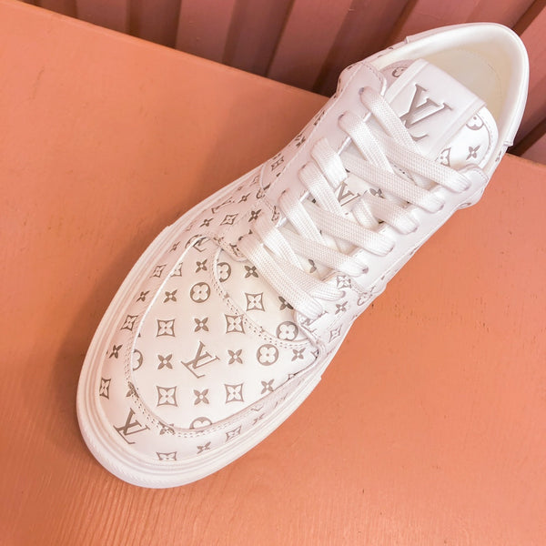 SNEAKER LV TRAINER IN PELLE DI VITELLO CON MONOGRAMMA BEIGE
