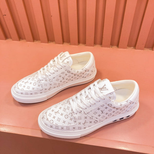 SNEAKER LV TRAINER IN PELLE DI VITELLO CON MONOGRAMMA BEIGE