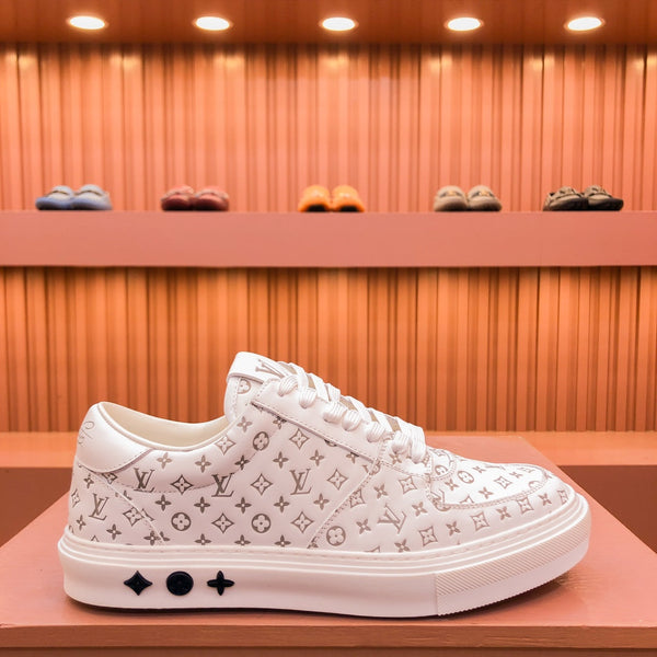 SNEAKER LV TRAINER IN PELLE DI VITELLO CON MONOGRAMMA BEIGE