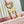 ONTHEGO PM 25 IN OPALE PINK MONOGRAM EMPREINTE LEATHER
