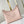 CARRYALL 29 IN LIGHT PINK MONOGRAM EMPREINTE LEATHER