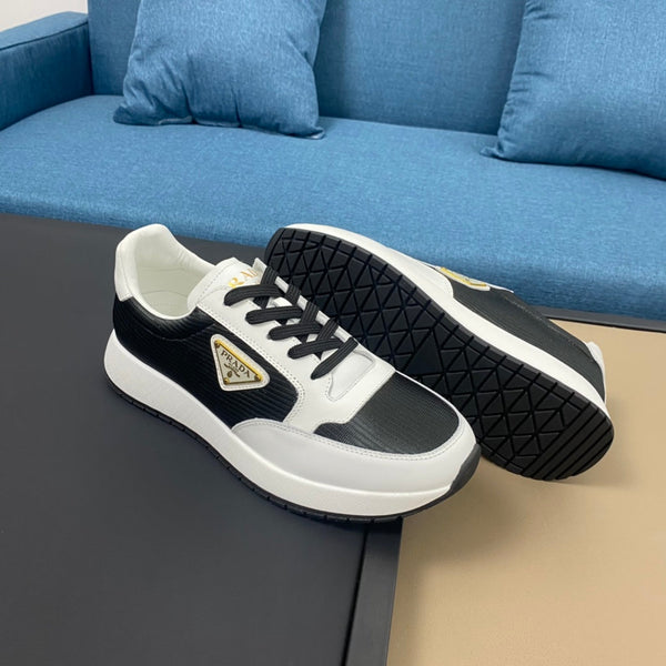 PRA SNEAKER IN WHITE CALFSKIN AND BLACK FABRIC WITH GOLDEN LOGO