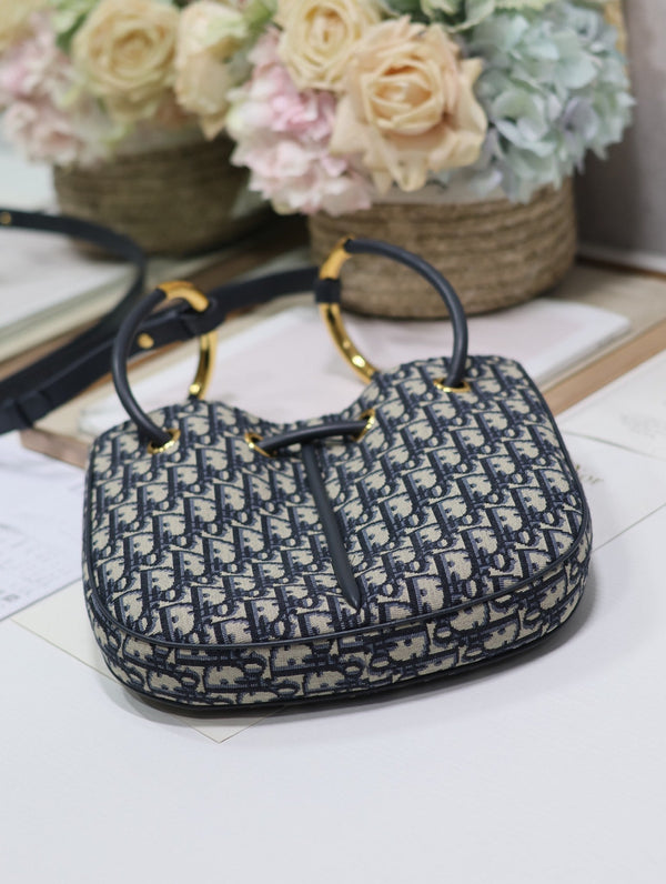 BORSA MINI 27 NOLITA IN JACQUARD OBLIQUO MONOGRAM BLU
